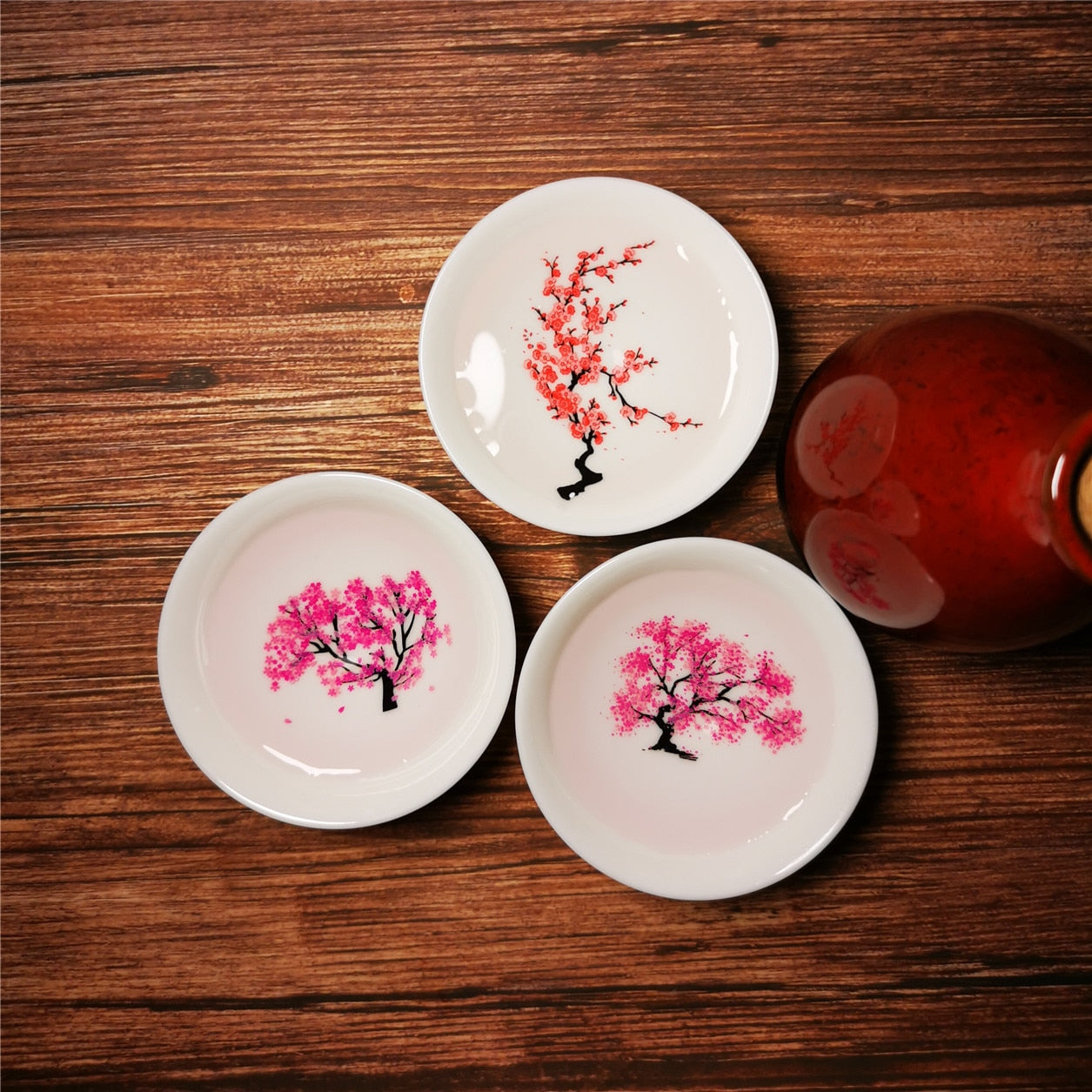 thumbnail image 2 of Hand-Painted Japanese Sake Set - 5 Piece Ceramic Collection With White And Pink Floral Design 2 of 3