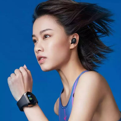a girl wearing the smartwatch while running