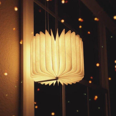 book lamp hanging on the wall