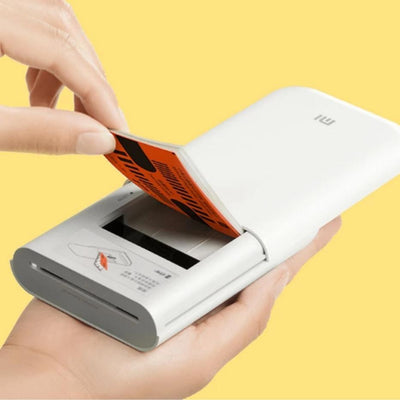 putting thermal paper in the portable printer