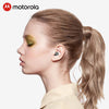A girl wearing Motorola earbuds