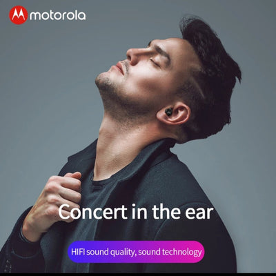 A man wearing Motorola earphones