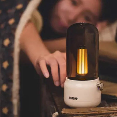 a girl using the retro lamp while sleeping